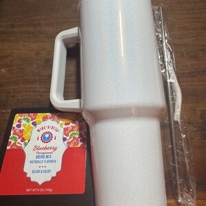 White Tumbler with removable Handle and straw & blueberry wine-a-Rita drink mix
